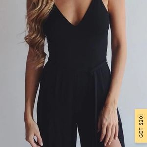 black jumpsuit with slit